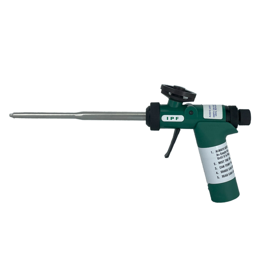 Green polyurethane foam dispensing gun with a long metal nozzle